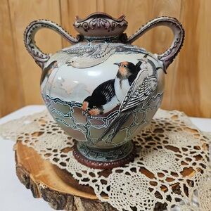 Elegant Handcrafted Vase with Bird Design